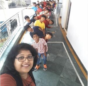 A selfie of Kalyani Rao with her students