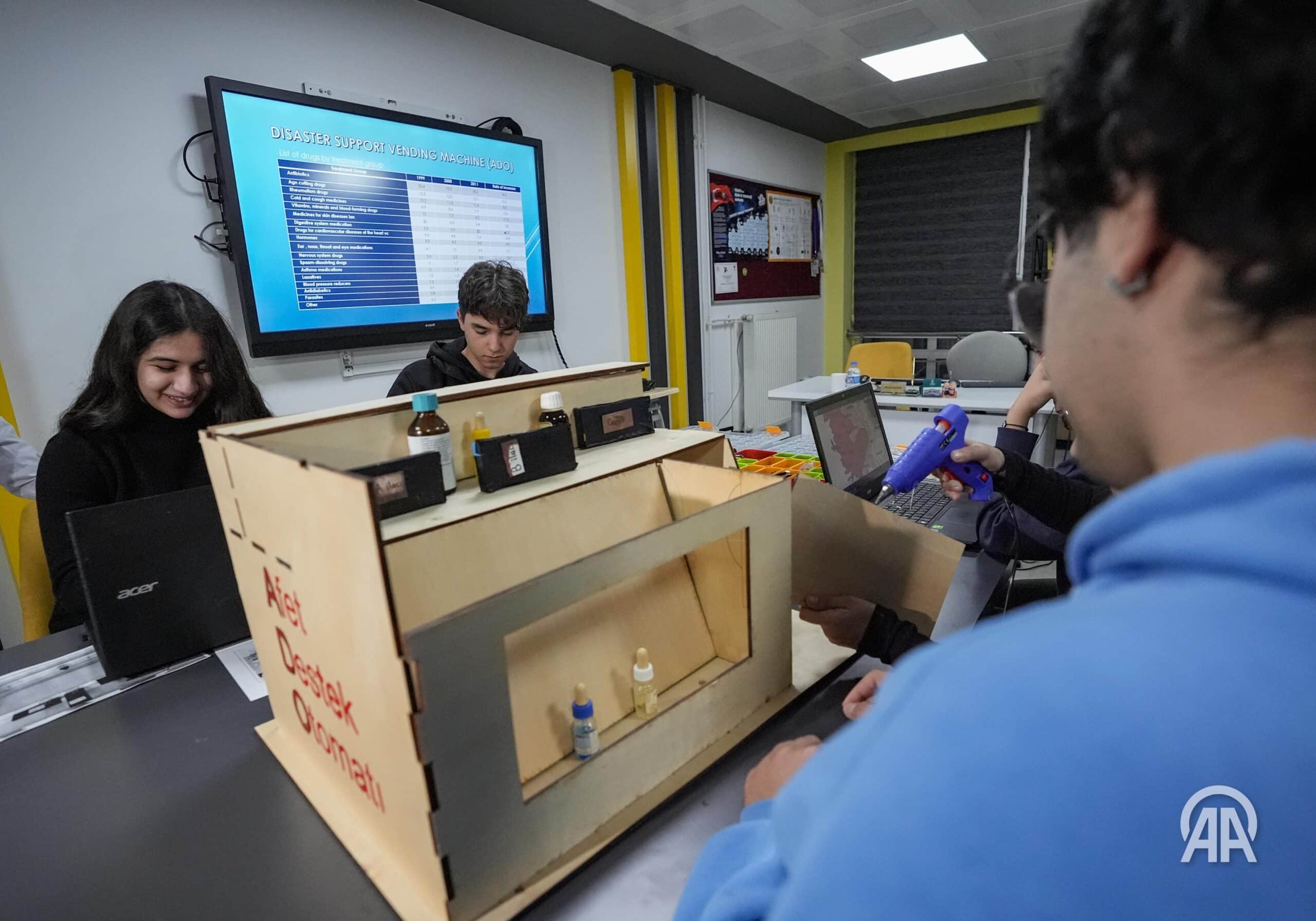 Students work on assembling a prototype labelled 