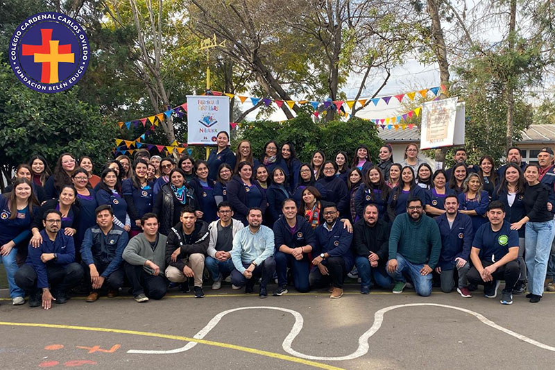 Staff of Colegio Bicentenario de Excelencia Carlos Oviedo gathered for a team photo in Santiago, Chile