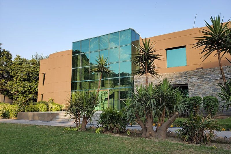 Exterior view of Nordic International School Lahore with modern architecture and greenery