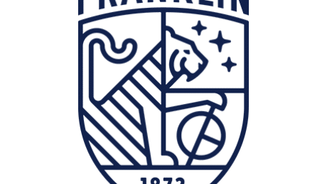 Franklin School crest featuring a stylized lion, stars, a globe, and the year 1872 in a navy blue shield.