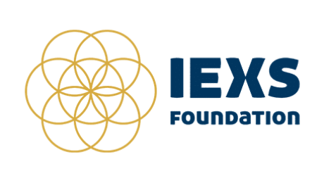 IEXS Foundation logo featuring interlocking gold circles on the left and bold blue text on the right.