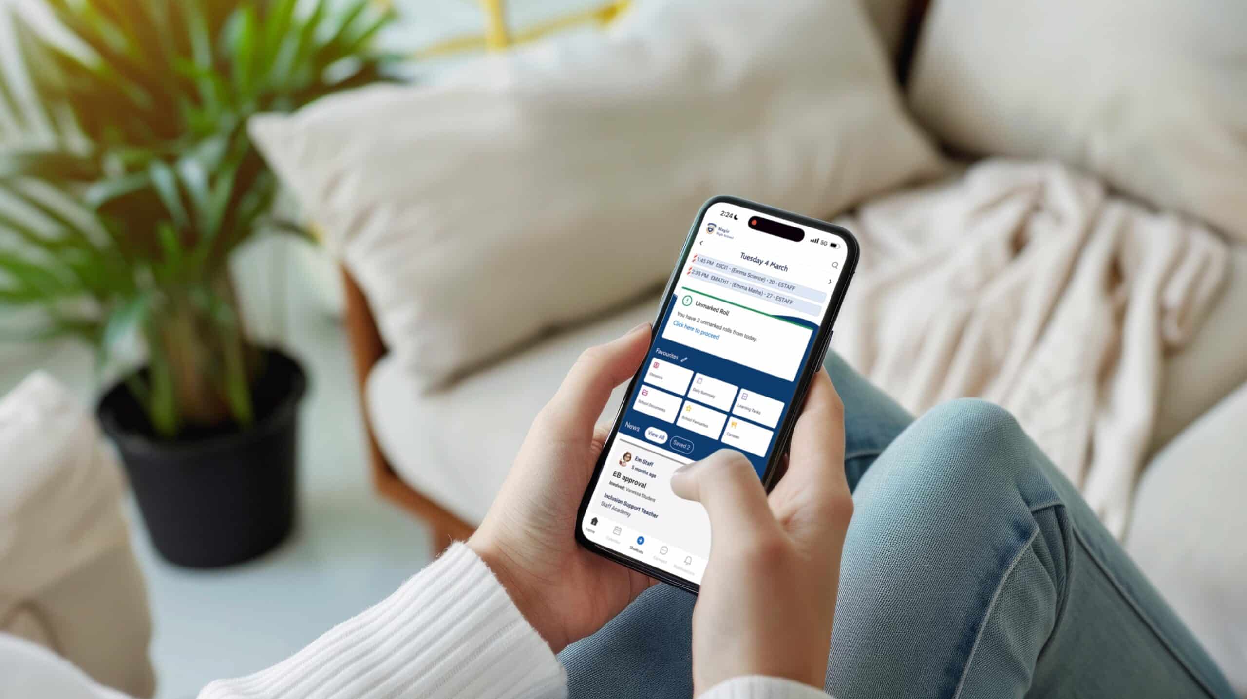 Person holding a smartphone, checking a mobile app interface with various options and notifications.