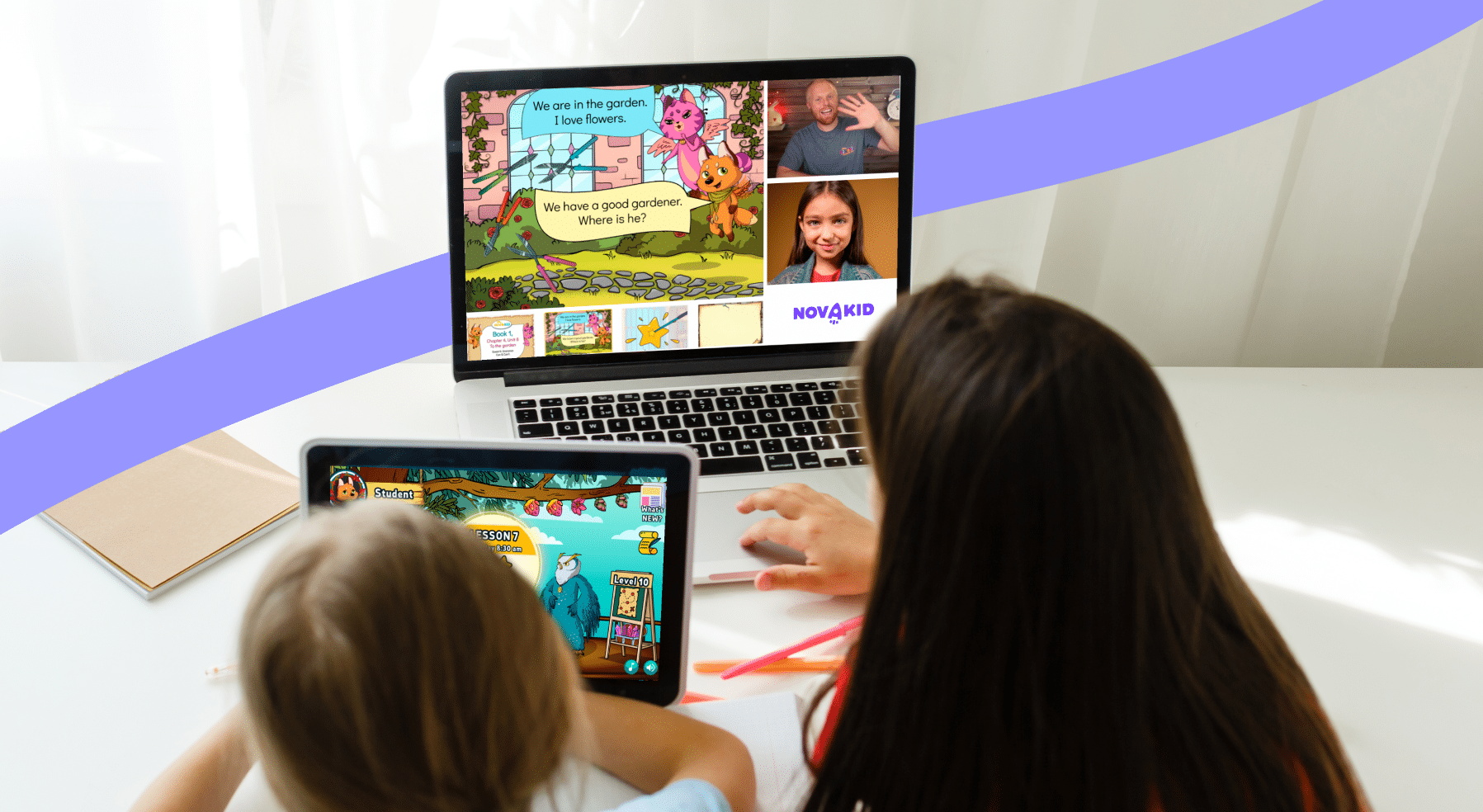 Two Children Learning Online Using Laptop and Tablet with Interactive Educational Games