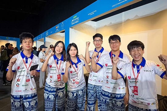 Student team participates in international F1 in Schools competition Team of students in matching uniforms posing with enthusiasm at an international F1 in Schools competition.