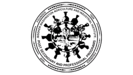 Emblem of Booker T. Washington Agriculture and Industrial Institute featuring a circular seal with silhouettes symbolizing education, industry, and progress.