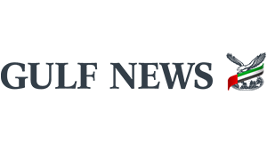 Gulf News logo featuring dark blue text with a stylized falcon graphic in UAE flag colours