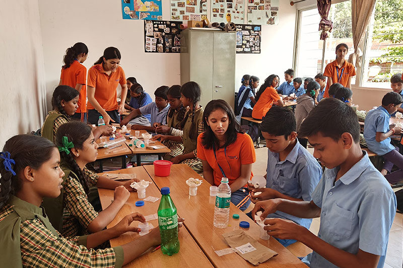 Students Participating in Group Movement and Performing Arts Activity