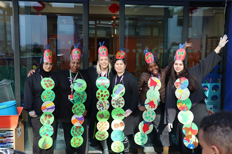 Educators participating in a creative school activity that promotes inclusion, collaboration, and student engagement.