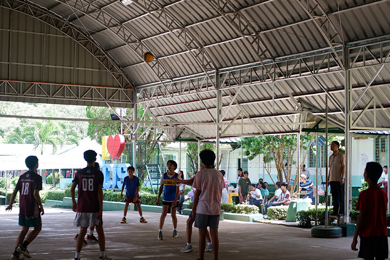 Students playing volleyball during a school sports and recreation programme at Cabog Cabog Integrated School