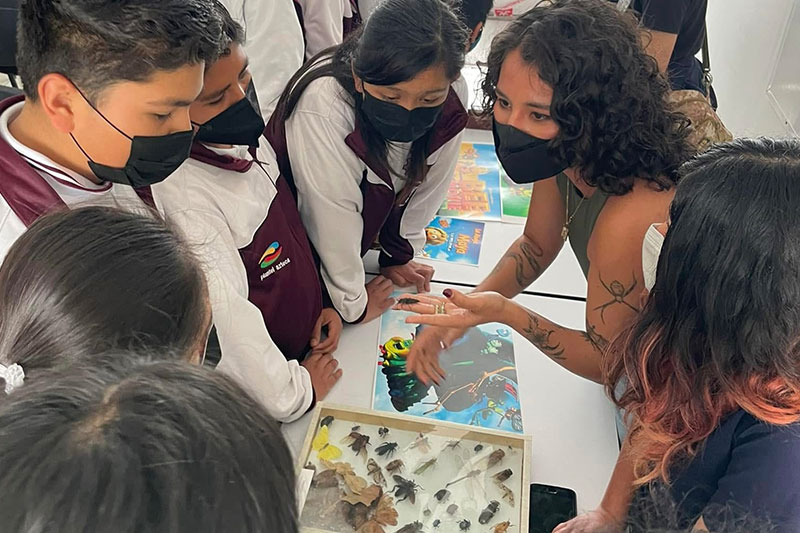 Students participating in a science workshop focused on biodiversity, ecology, and environmental awareness through hands-on learning.