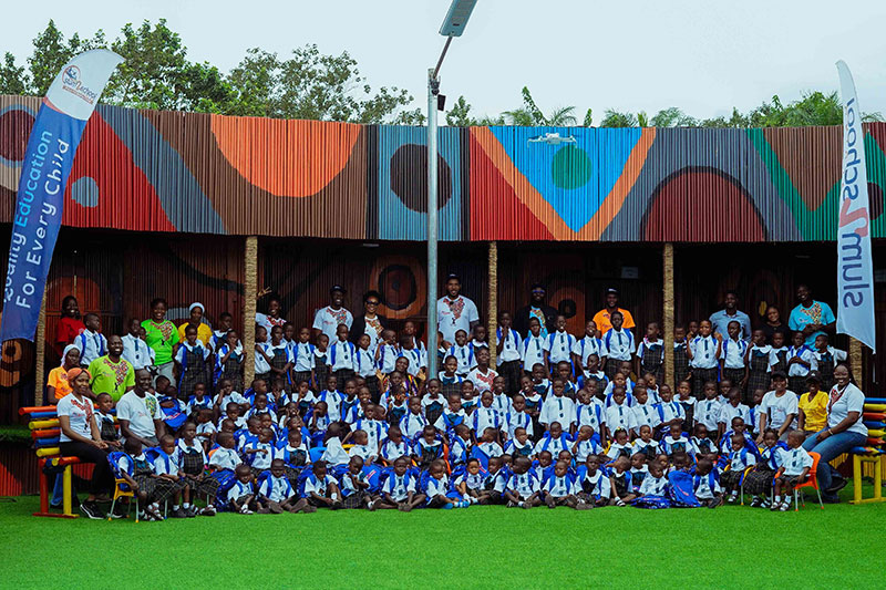 Students, educators and volunteers gathered at a Slum2School Africa education centre for a community learning programme