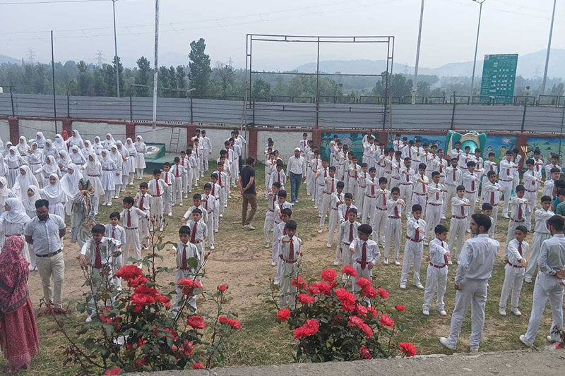 Students gathered for a school assembly at Army Good Will School Wuzur, demonstrating discipline and community spirit
