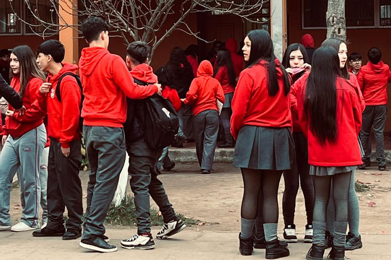 Secondary school students gathered between classes at Liceo Bicentenario de Excelencia Oriente de Rengo