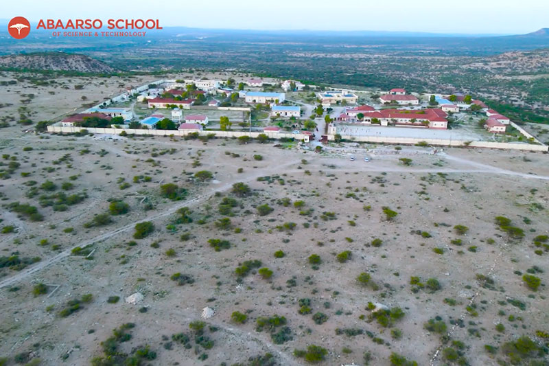 Aerial view of Abaarso School of Science and Technology campus in Somaliland showcasing school buildings and surrounding landscape