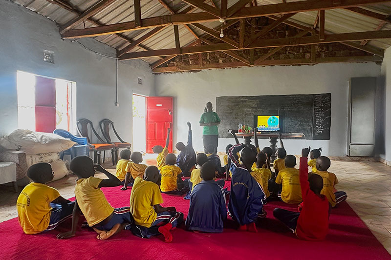 Young learners engaged in an interactive classroom lesson at Roshen Lakeview Academy