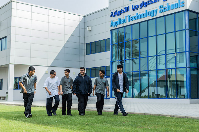 Students walking across the Applied Technology Schools campus showcasing modern technical education facilities