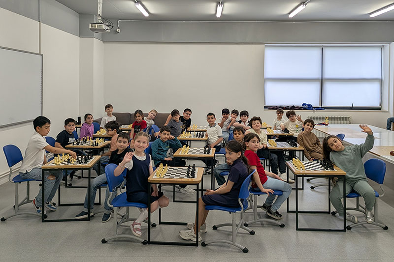 Students participating in a classroom chess program that develops critical thinking, strategy and problem-solving skills