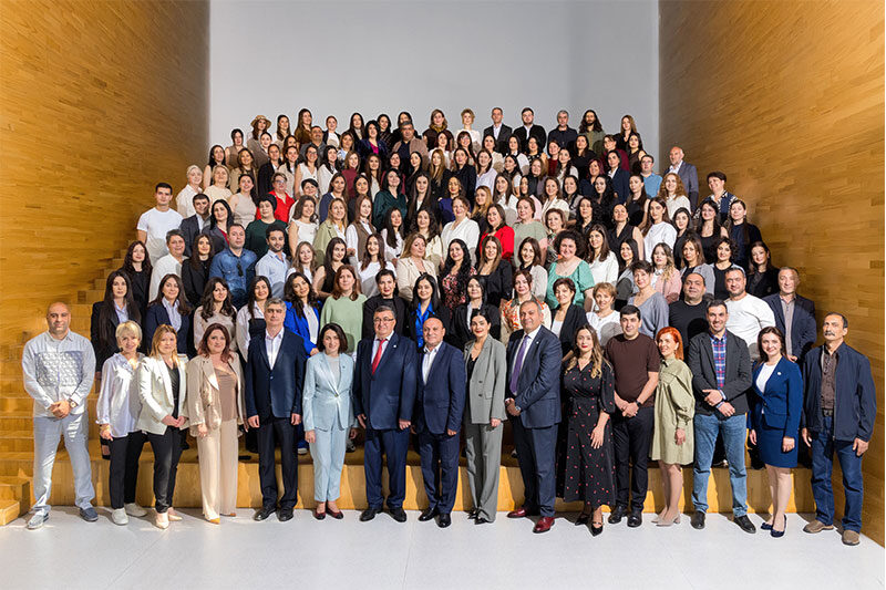 Educational Sustainability Center leadership, educators and students gathered for a group photograph celebrating educational excellence