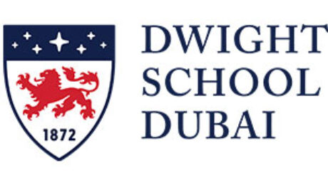 Dwight School Dubai logo featuring a red lion crest and the text Dwight School Dubai