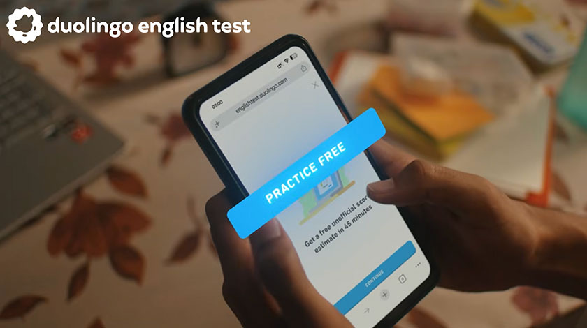 Duolingo English Test free practice test on a smartphone, allowing users to get an unofficial score estimate in 15 minutes.