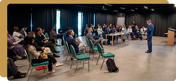 T4 Global EdTech Prize Presentation and Audience Audience attending a presentation at a global education and EdTech event